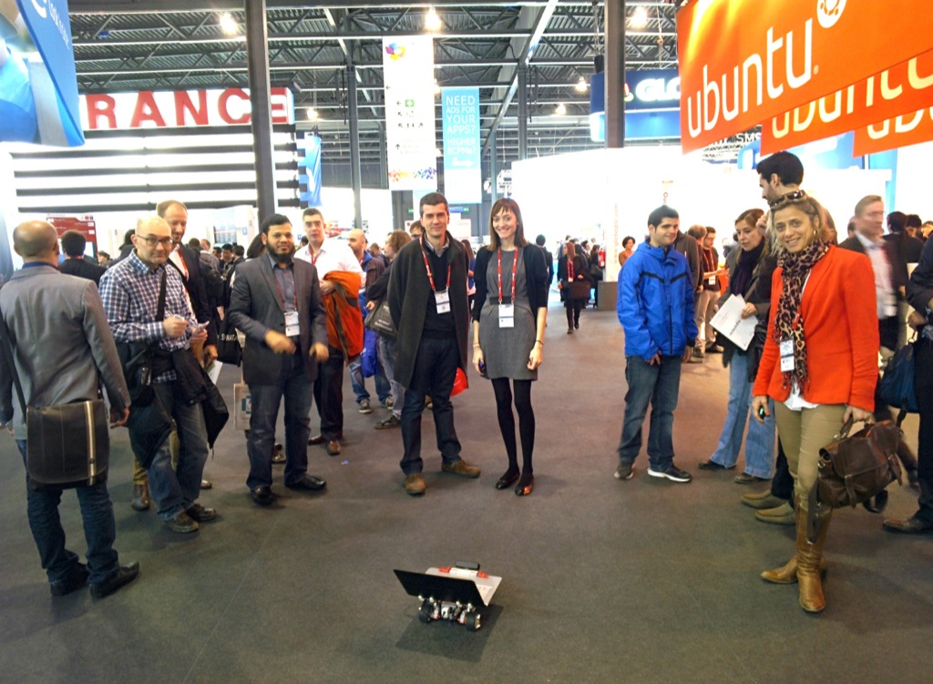 Rover at Mobile World Congress attracting crowd of people.