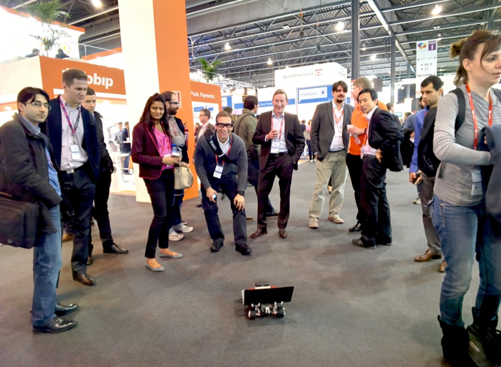 Rover at Mobile World Congress attracting crowd of people.